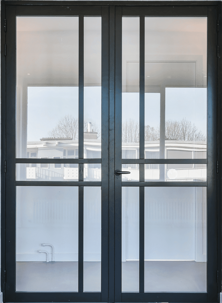 Glass sliding patio door with black metal frame and clear glass windows.